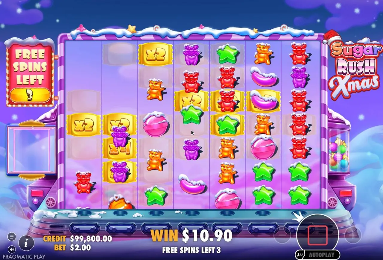 Sugar Rush Xmas free spins under a night sky: x2 and x4 wrappers on the grid, 3 free spins left