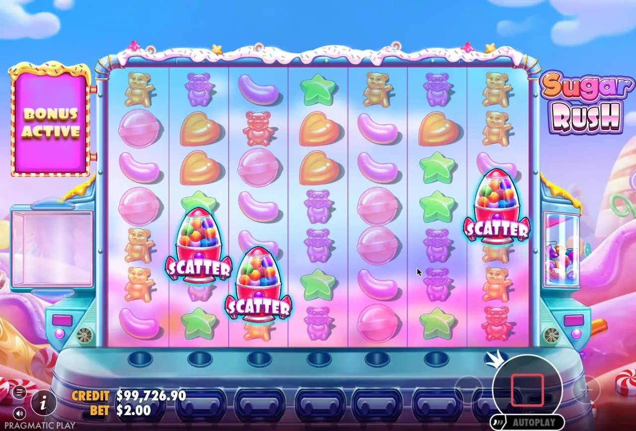 Three pink gumball rocket scatters on the Sugar Rush grid triggering free spins